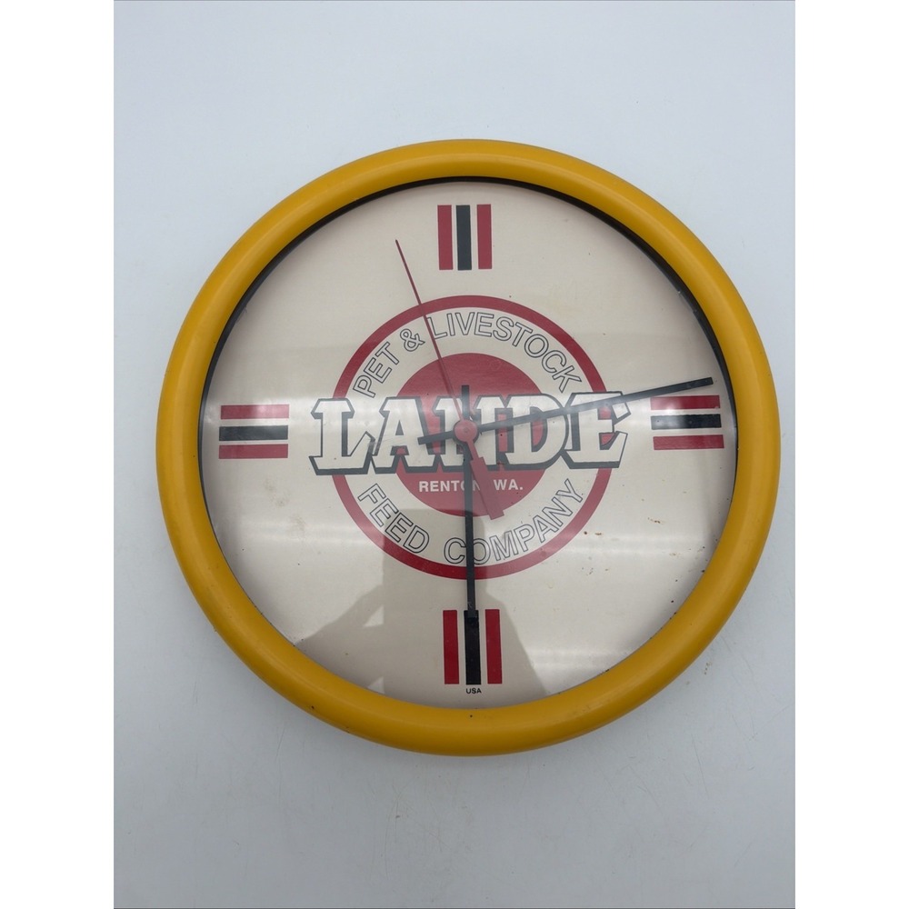 vintage-style advertising wall clock for the Lande Pet & Livestock Feed Company